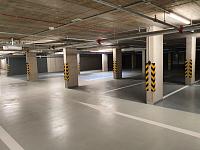 Montáž rohovníků na sloupy v podzemní garáži